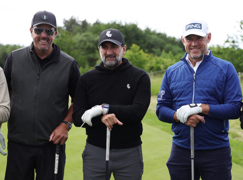 Phil Mickelson, left, and Lee Westwood, right, pose with Newcastle United chairman Yasir Al-Rumayyan before the inaugural LIV Golf Invitational