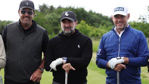 Phil Mickelson, left, and Lee Westwood, right, pose with Newcastle United chairman Yasir Al-Rumayyan before the inaugural LIV Golf Invitational