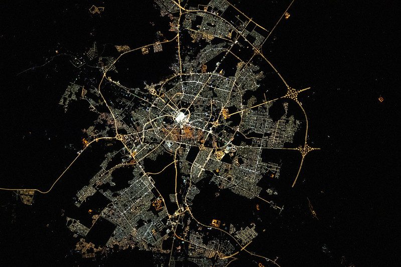 The city lights of Medina in western Saudi Arabia flicker in a picture taken from space