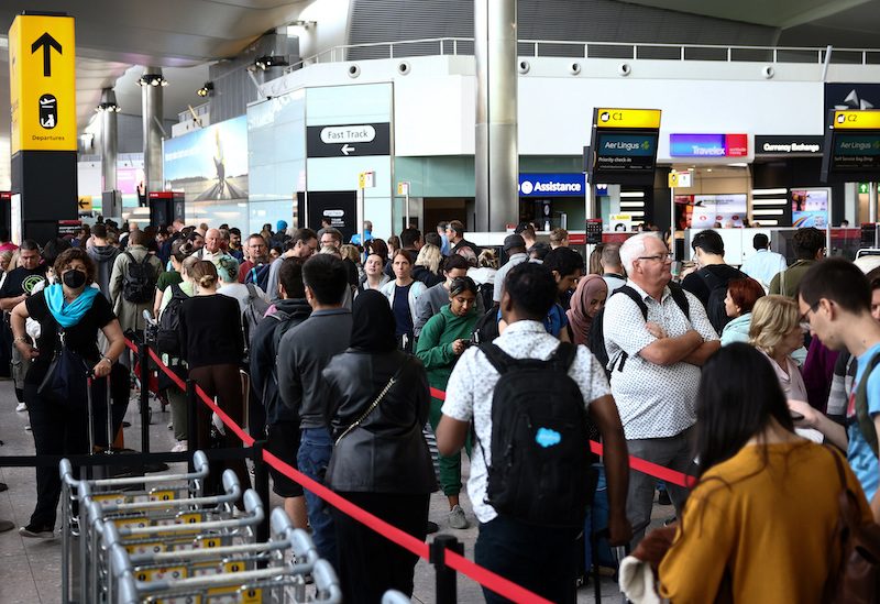 Passengers queue at Heathrow Terminal 2. Mubadala is considering an investment after being approached by buyout company Ardian