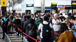 Passengers queue at Heathrow Terminal 2. Mubadala is considering an investment after being approached by buyout company Ardian