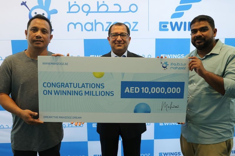 Farid Samji with lottery winners