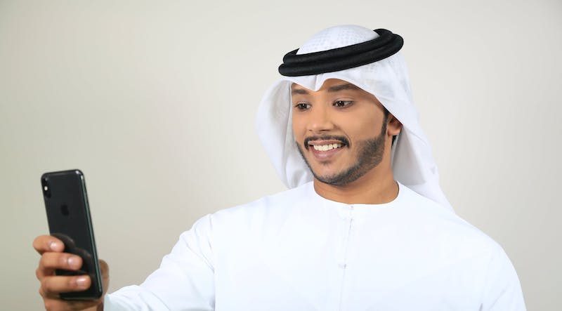 Smiling until he sees the bill: mobile data does not come cheap in Dubai