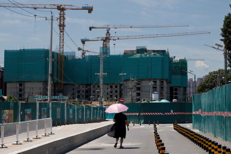 Apartment blocks under construction in Beijing, seen on July 15. China surprised many by cutting its loan prime rates