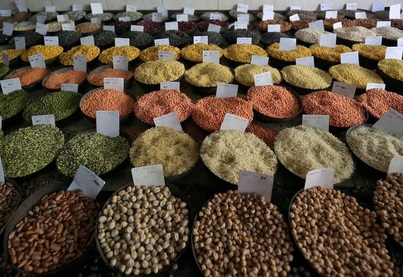 Samples of rice and lentils for sale at a wholesale market in Delhi