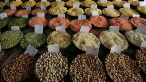 Samples of rice and lentils for sale at a wholesale market in Delhi