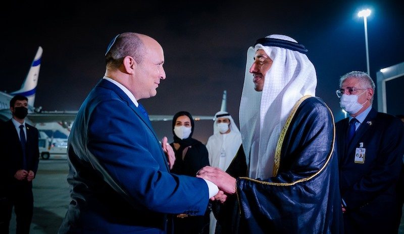 UAE minister of foreign affairs Sheikh Abdullah bin Zayed Al Nahyan, right, welcomes Naftali Bennett at Abu Dhabi International Airport when the Israeli prime minister visited last December