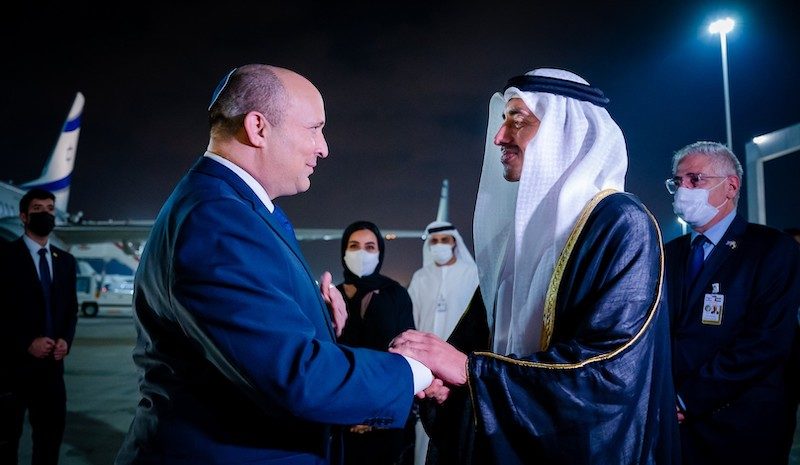 UAE minister of foreign affairs Sheikh Abdullah bin Zayed Al Nahyan, right, welcomes Naftali Bennett at Abu Dhabi International Airport when the Israeli prime minister visited last December