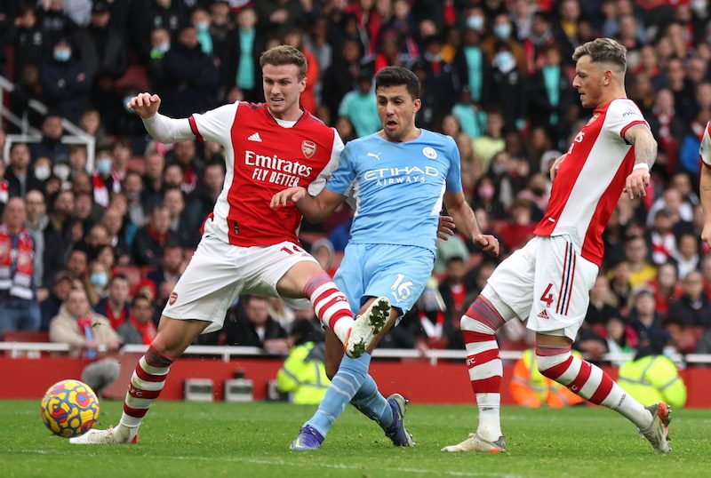 Arsenal and Manchester City may battle it out on the pitch but their sponsors enjoy a fierce competition of their own