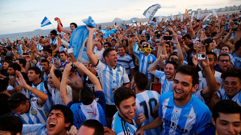 Argentina fans on Copacabana beach in Rio during the 2014 World Cup. Visiting fans represented 0.7% of the population in Brazil. For Qatar, the percentage will be far higher