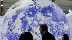 The summit's main stage opens for panel discussions and presentations by business leaders, civil society members, scientists and students