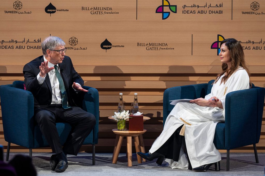 Bill Gates speaks to Rima al Mokarrab at the Catalytic Philanthropy Forum