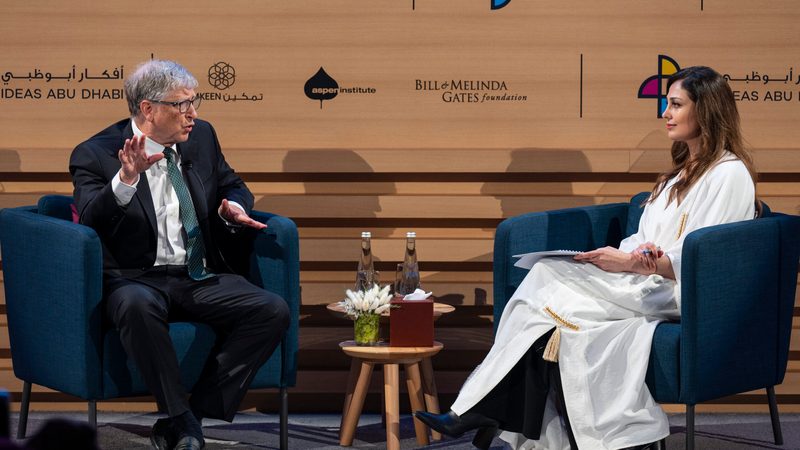 Bill Gates speaks to Rima al Mokarrab at the Catalytic Philanthropy Forum