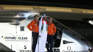 Sultan Al Jaber meets pilots Andre Borschberg and Bertrand Piccard after the solar-powered plane Solar Impulse landed in Abu Dhabi on July 26, 2016. Al Jaber remains chairman of renewables specialist Masdar