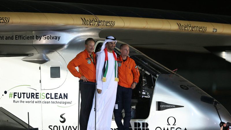 Sultan Al Jaber meets pilots Andre Borschberg and Bertrand Piccard after the solar-powered plane Solar Impulse landed in Abu Dhabi on July 26, 2016. Al Jaber remains chairman of renewables specialist Masdar