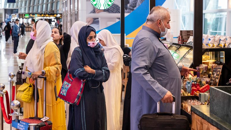 Travellers buy coffee at Jeddah airport. Non-oil business activity is rising in Saudi Arabia