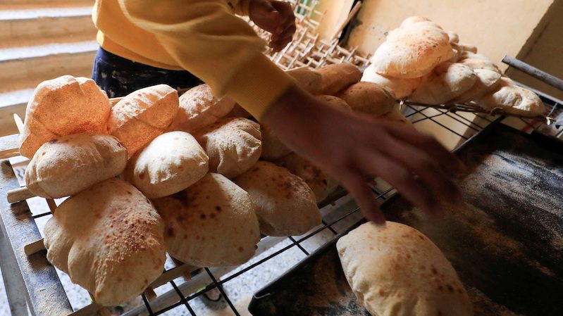 Making bread at a bakery in Cairo. Grain and bread prices fell by 0.6 percent month-on-month