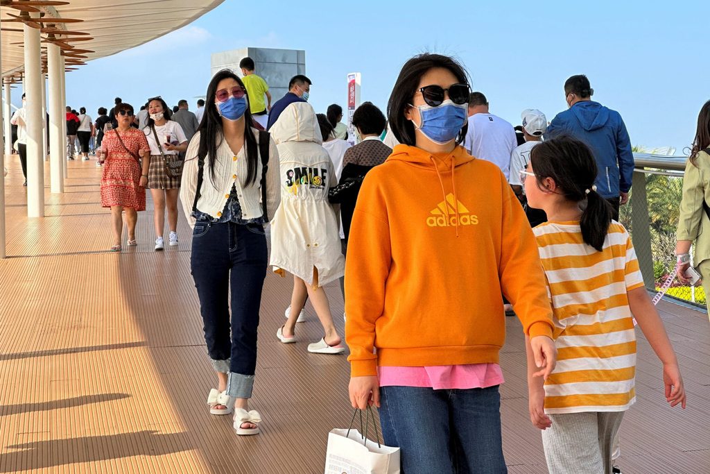 Chinese shoppers at a mall in Sanya, Hainan province, on January 25. Analysts expect China's economy to recover quickly after the lifting of Covid restrictions