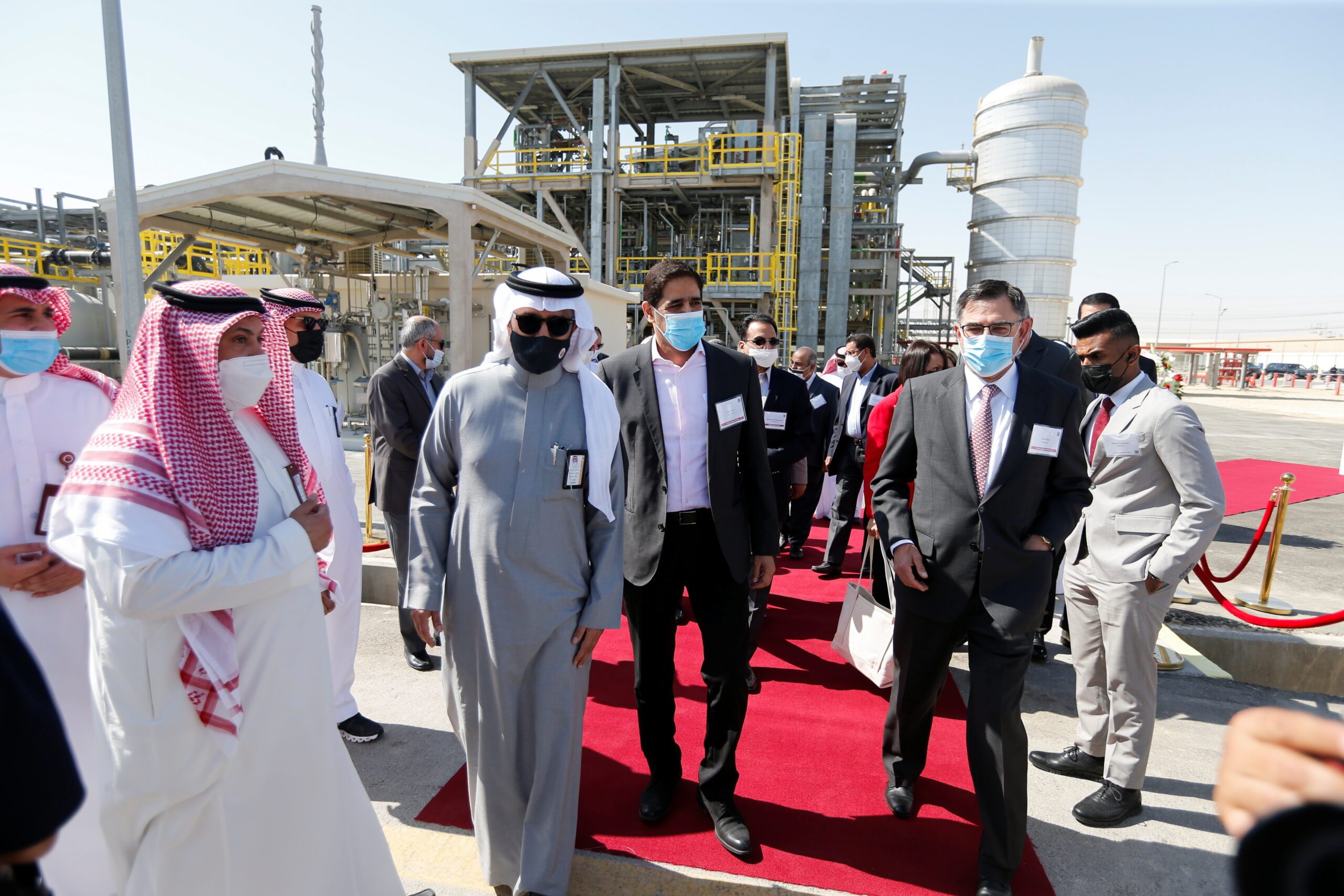 Halliburton's president and CEO Jeff Miller and Aramco's senior vice president of upstream Nasir Al-Naimi arrive for a ceremony to inaugurate the first Halliburton Chemical Reaction Plant in Saudi Arabia
