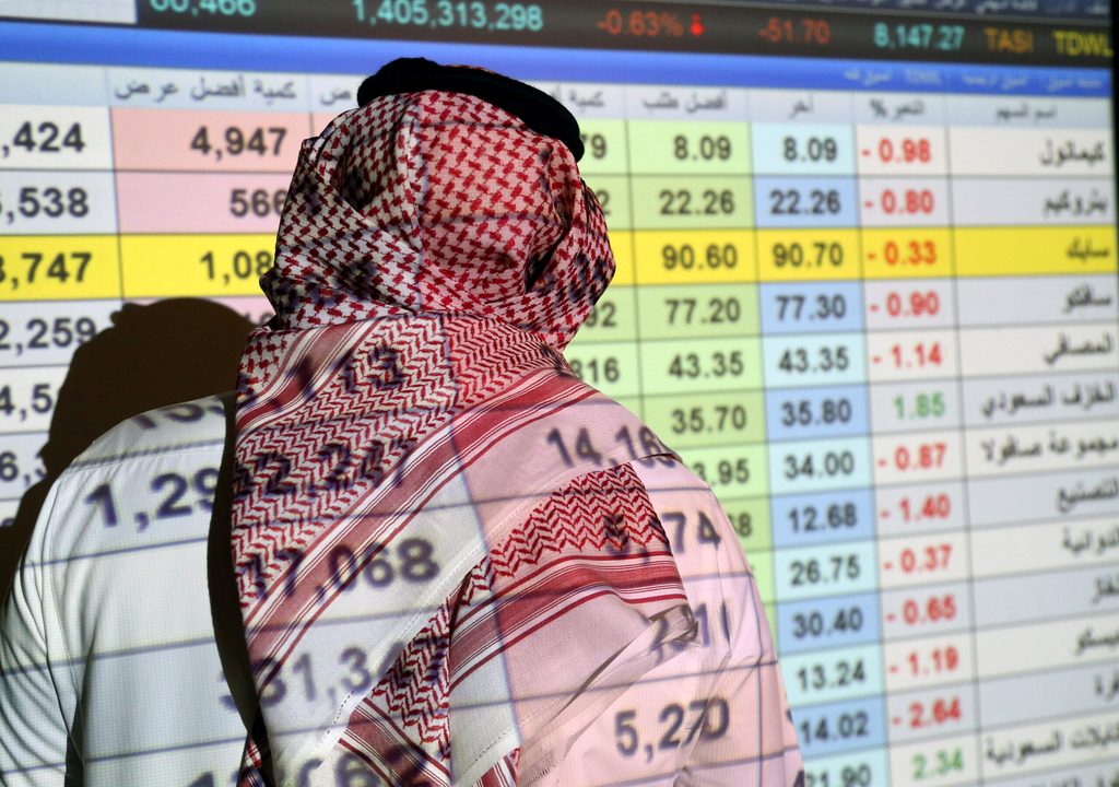 A Saudi trader monitors stocks. The $44bn borrowing figure for January 2023 surpasses the previous peak of $33bn, reached in January 2018