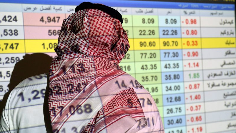 A Saudi trader monitors stocks. The $44bn borrowing figure for January 2023 surpasses the previous peak of $33bn, reached in January 2018