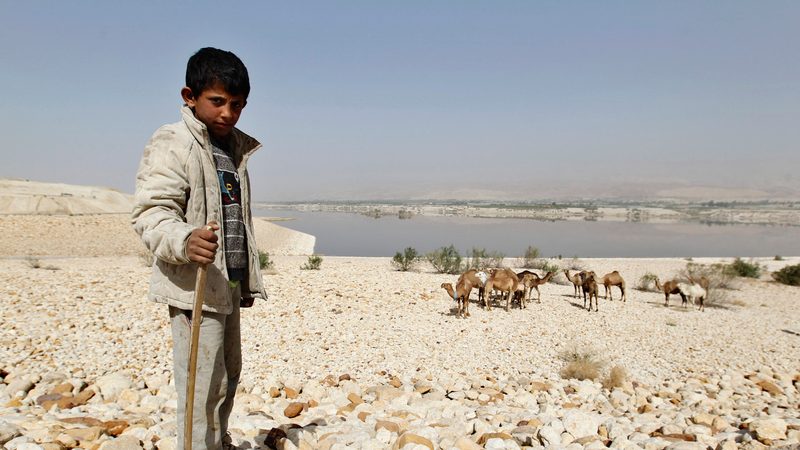 Jordan's Al Karamah Dam, shrunk by drought. US fund manager BlackRock sees investment opportunities in tech to improve water systems and other infrastructure