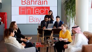Bahrain FinTech Bay is seen as staff chat in its office in Bahrain Bay, Manama, Bahrain
