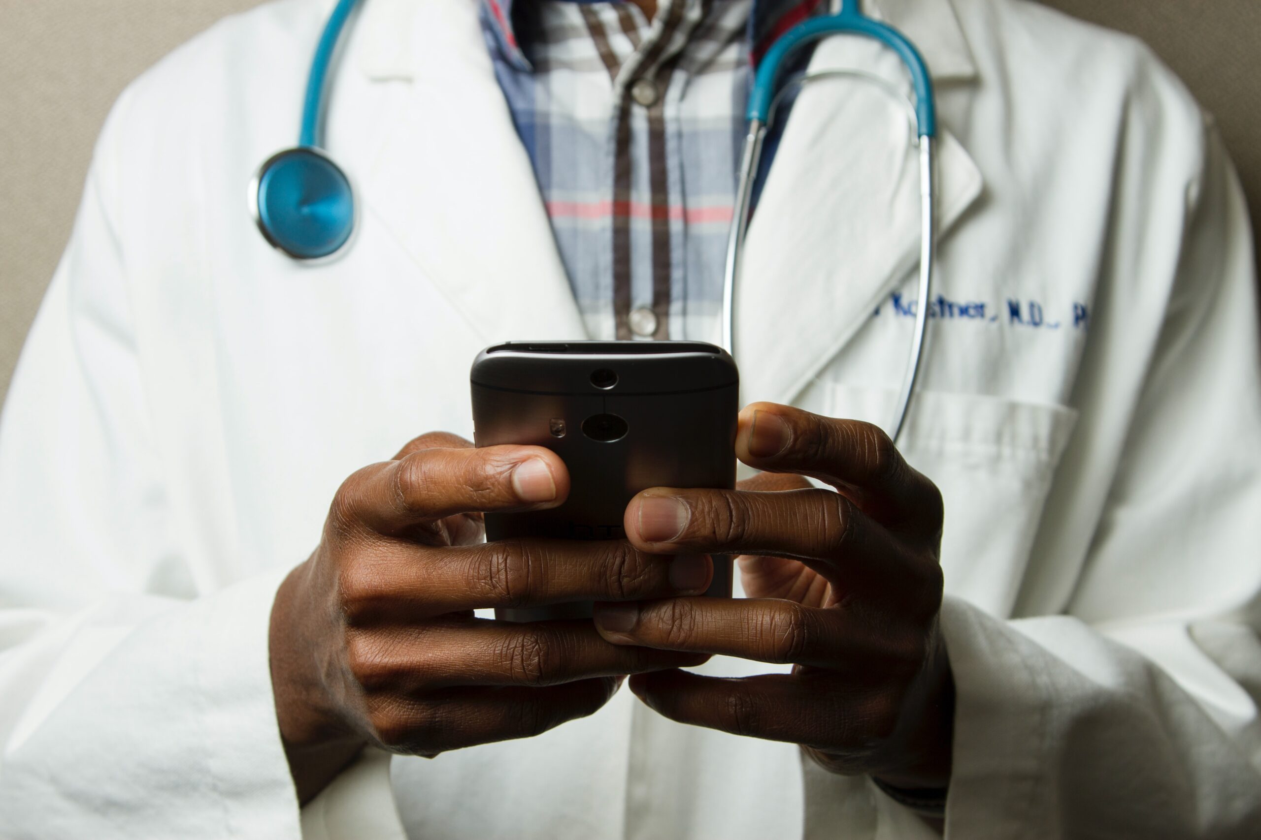 doctor, stethoscope, phone