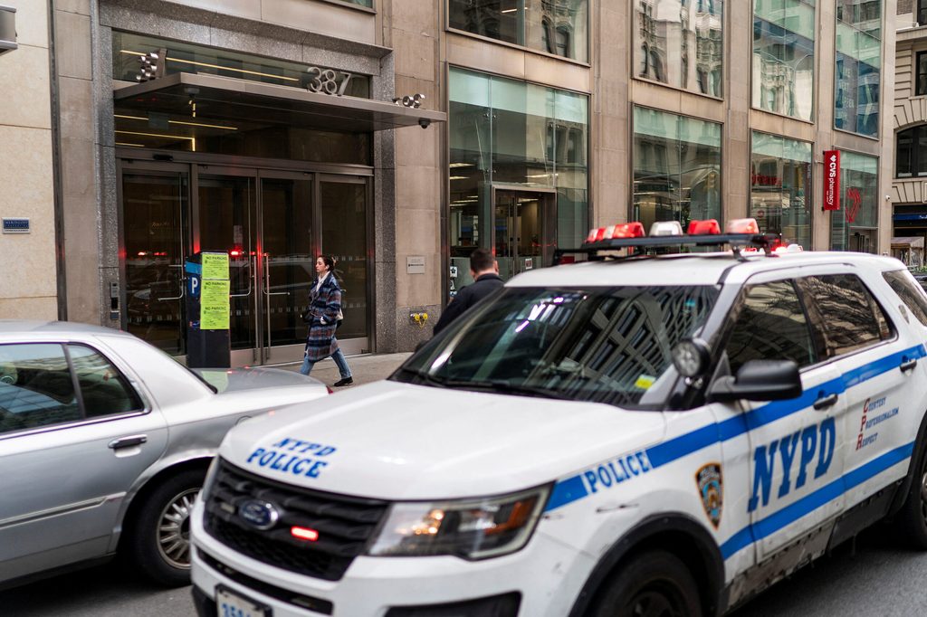 A New York City Police vehicle is parked in front of the Park Avenue branch of Silicon Valley Bank in the US