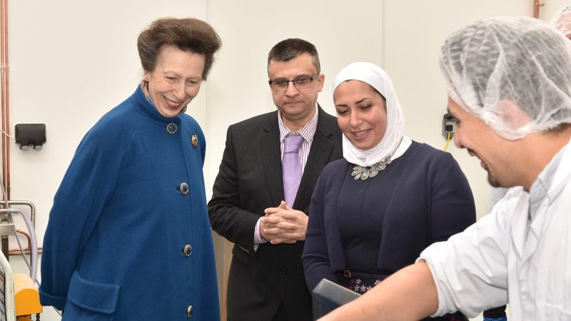 Razan Al Sous, founder of Yorkshire Dama Cheese, second from right, shows the Princess Royal her wares