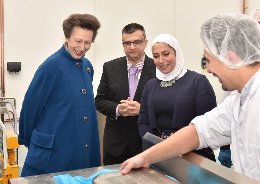 Razan Al Sous, founder of Yorkshire Dama Cheese, second from right, shows the Princess Royal her wares