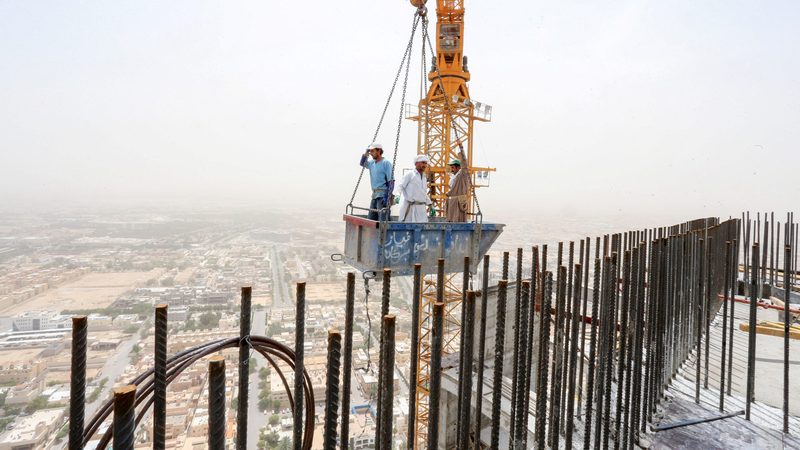 Workers on a construction site in Riyadh GCC