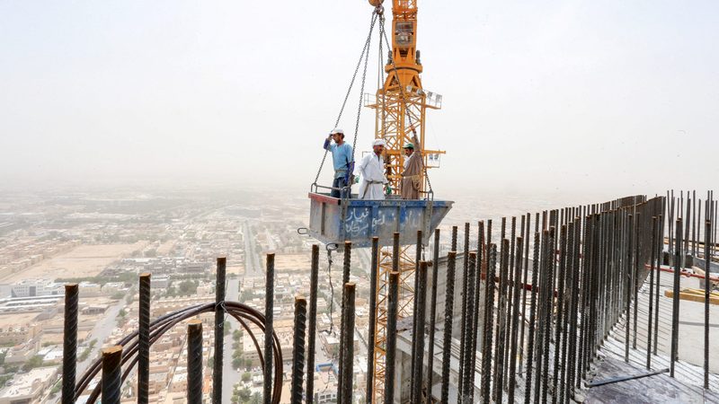 Workers on a construction site in Riyadh GCC