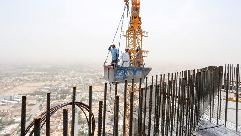 Workers on a construction site in Riyadh GCC