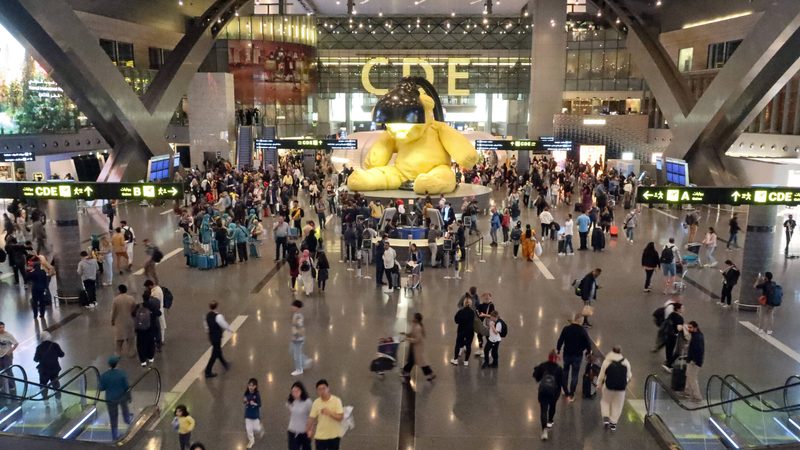 Passengers at Doha airport in Qatar. Direct flights to Bahrain will restart on May 25