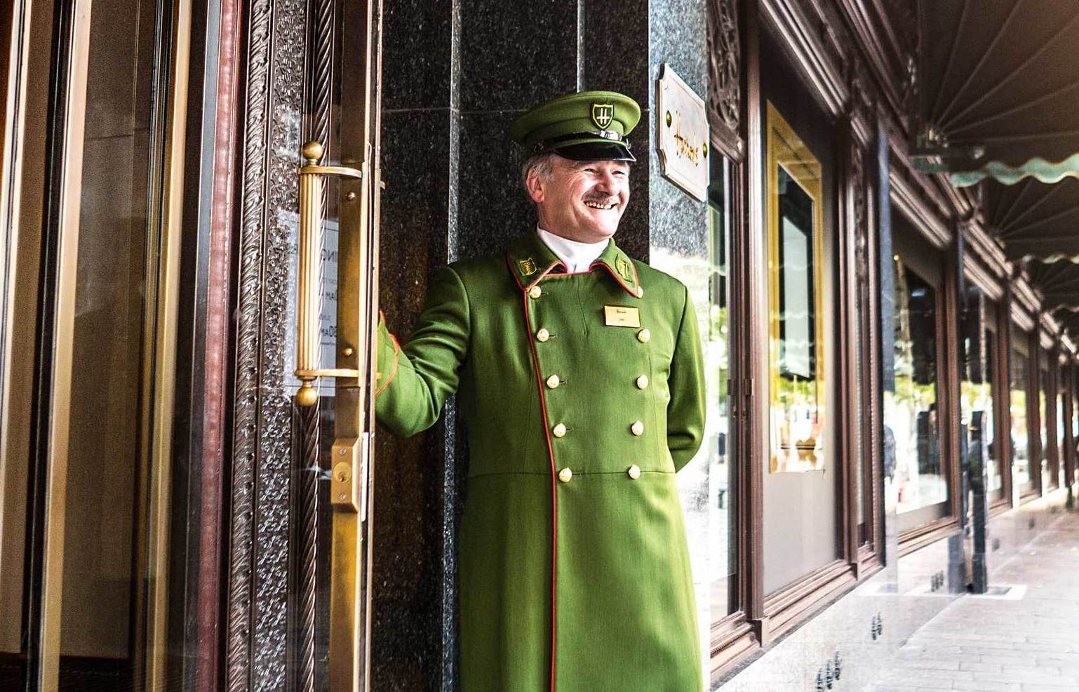 A doorman at the London department store. The Qatar Investment Authority bought it in 2010
