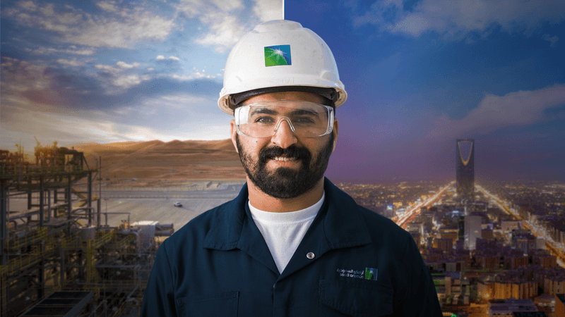 Aramco worker with Saudi in background