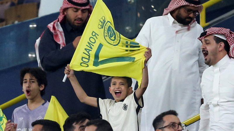 Crowd cheer for Saudi sports team Al Nassr, home to Ronaldo