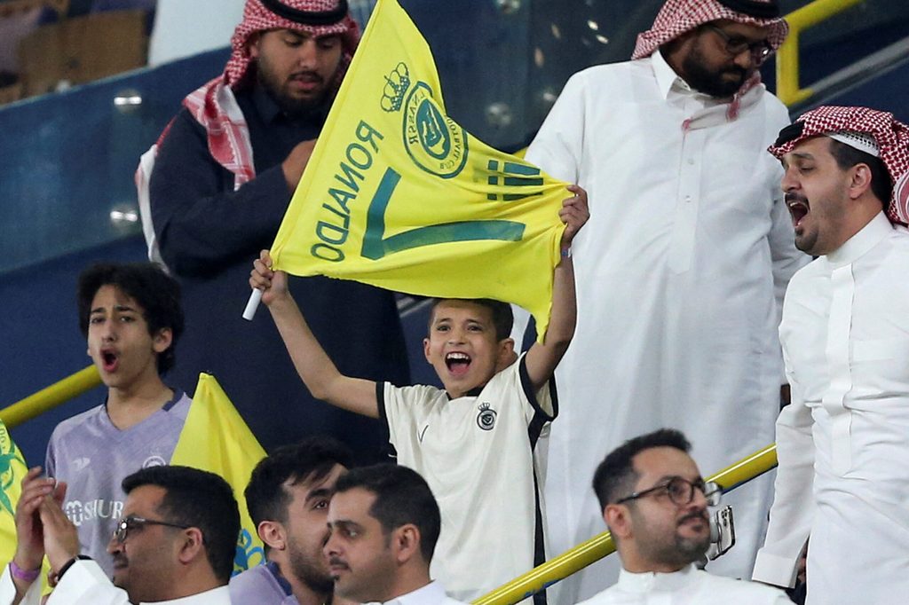 Crowd cheer for Saudi sports team Al Nassr, home to Ronaldo