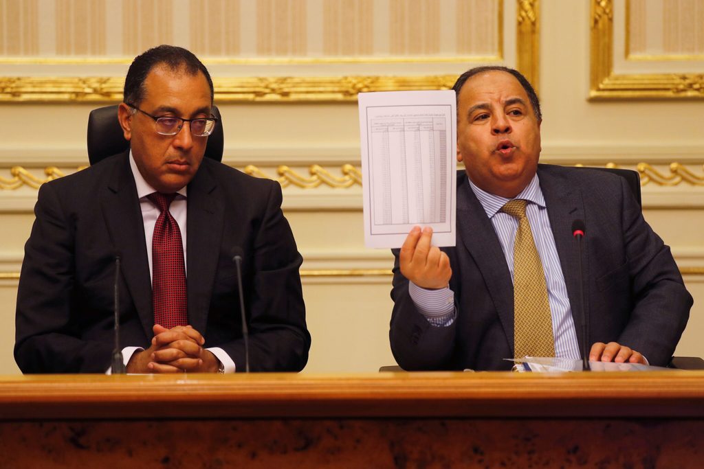 Egypt's prime minister Mostafa Madbouly and his finance minister Mohamed Maait. Egypt plans to sell state assets to attract $40 billion in investment