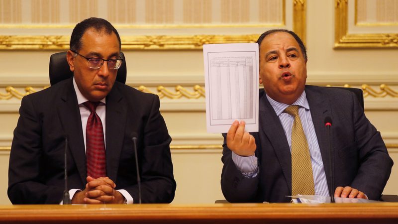 Egypt's prime minister Mostafa Madbouly and his finance minister Mohamed Maait. Egypt plans to sell state assets to attract $40 billion in investment