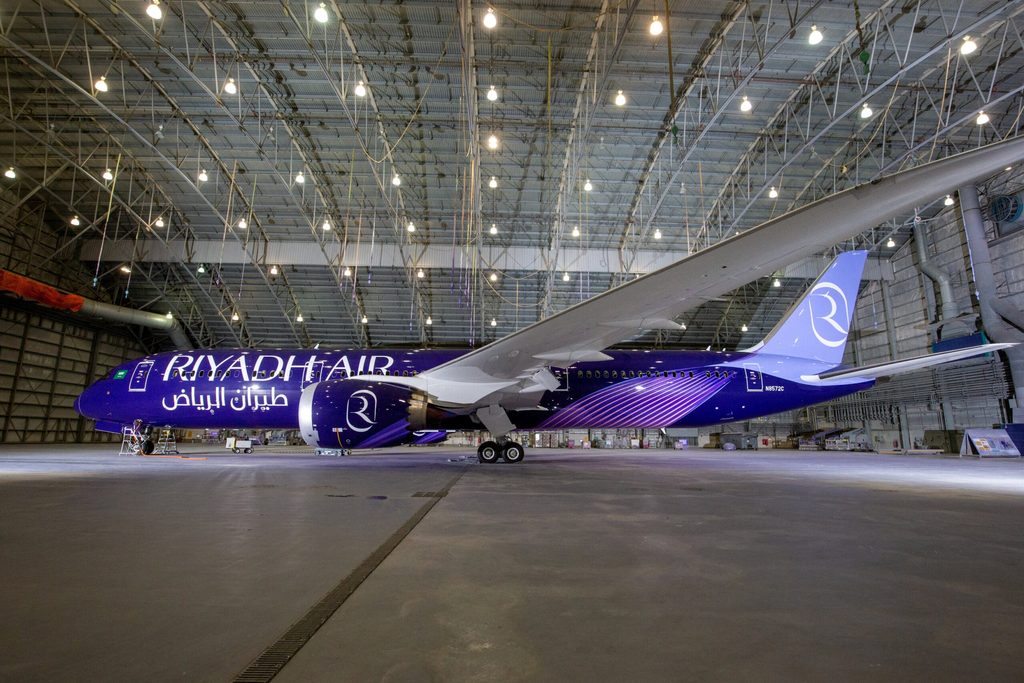 A Riyadh Air Boeing with its shiny new livery