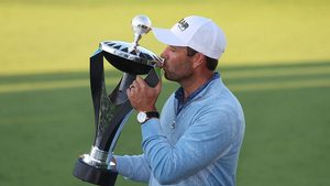 South Africa's Charl Schwartzel of the Stinger team celebrates with the trophy after winning the inaugural LIV Golf Invitational