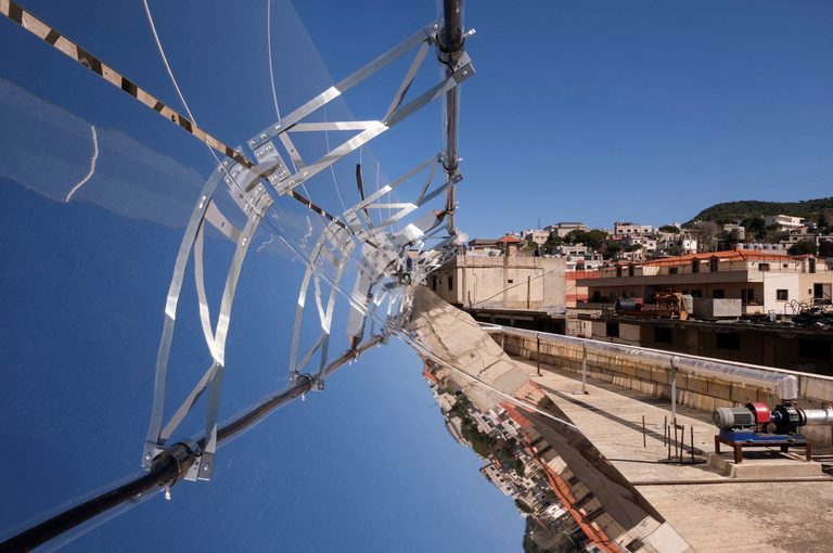 Solar power panels installed on the rooftop of a bakery in Remhala, Lebanon