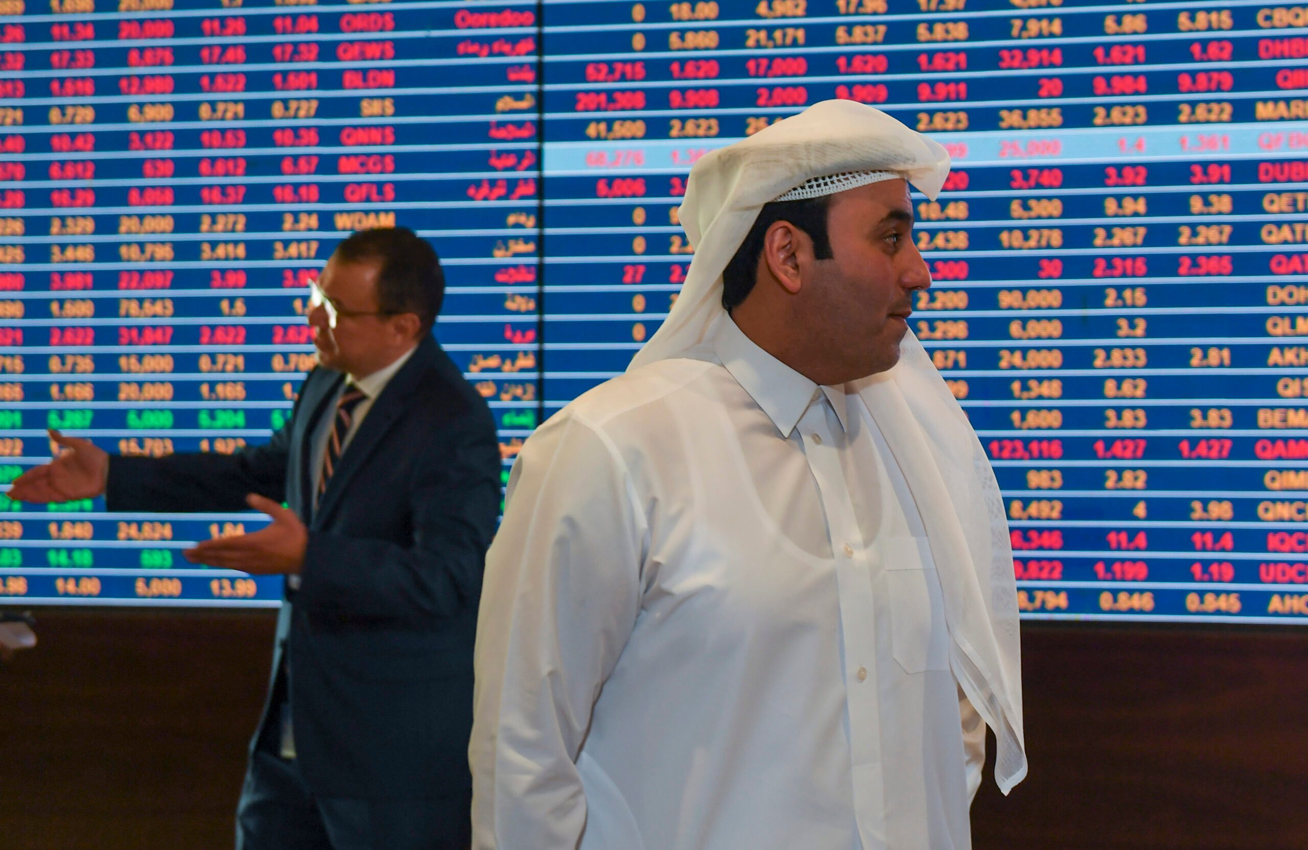 Traders at the Qatar Stock Exchange. The country's cryptocurrency legislation is expected early next year