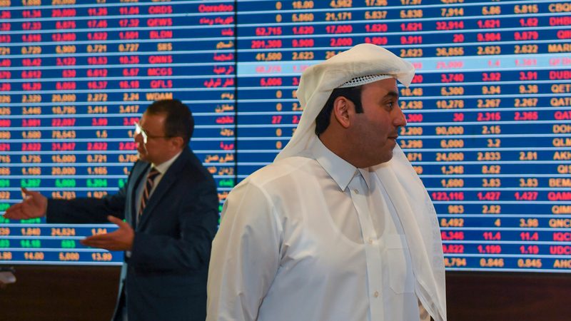 Traders at the Qatar Stock Exchange. The country's cryptocurrency legislation is expected early next year