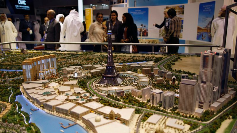Visitors look at the Falconcity of Wonders model at a Dubai property fair in 2012