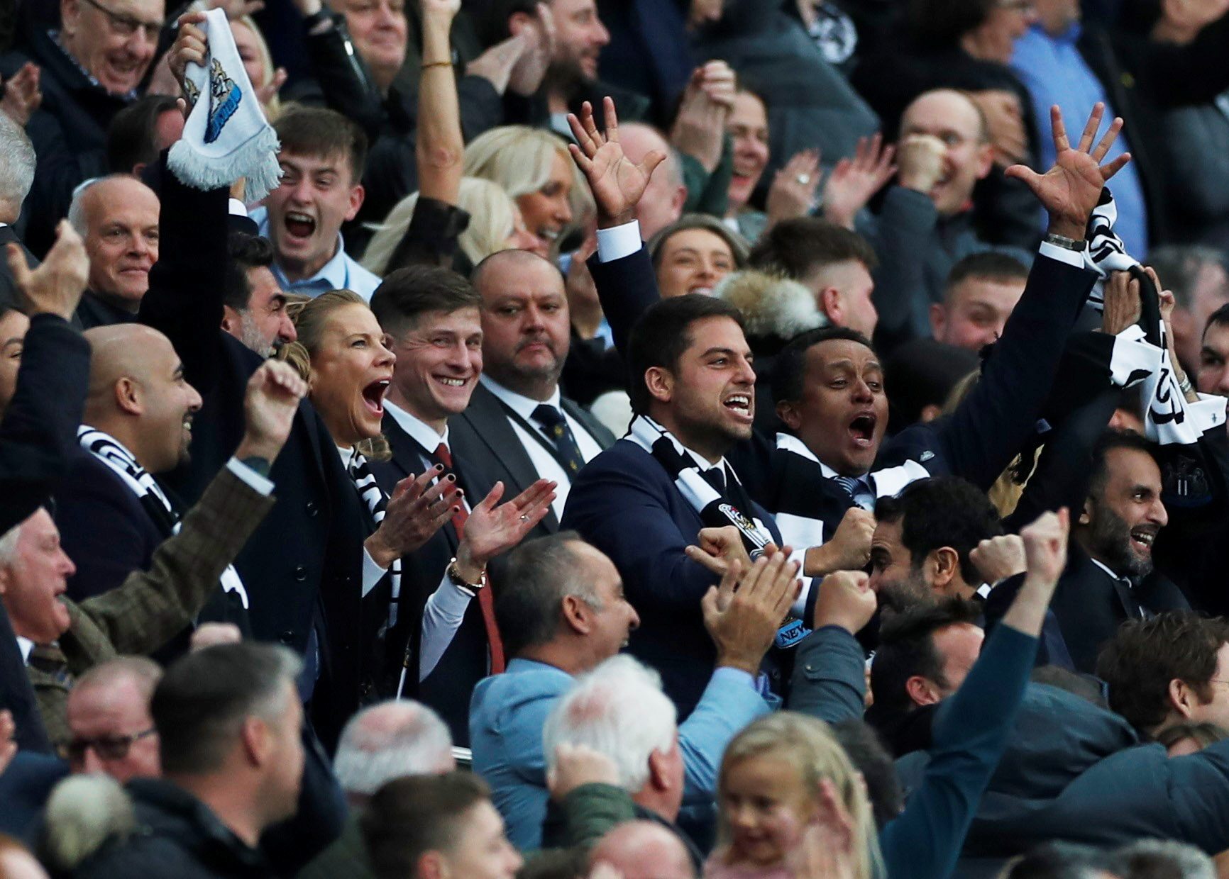 Newcastle United chairman Yasir Al-Rumayyan (left) celebrates with part owner Amanda Staveley in the stands after Newcastle United's Callum Wilson score against Tottenham in 2021 