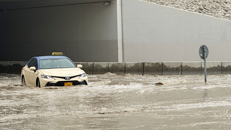 Taxi in UAE caught in flooding