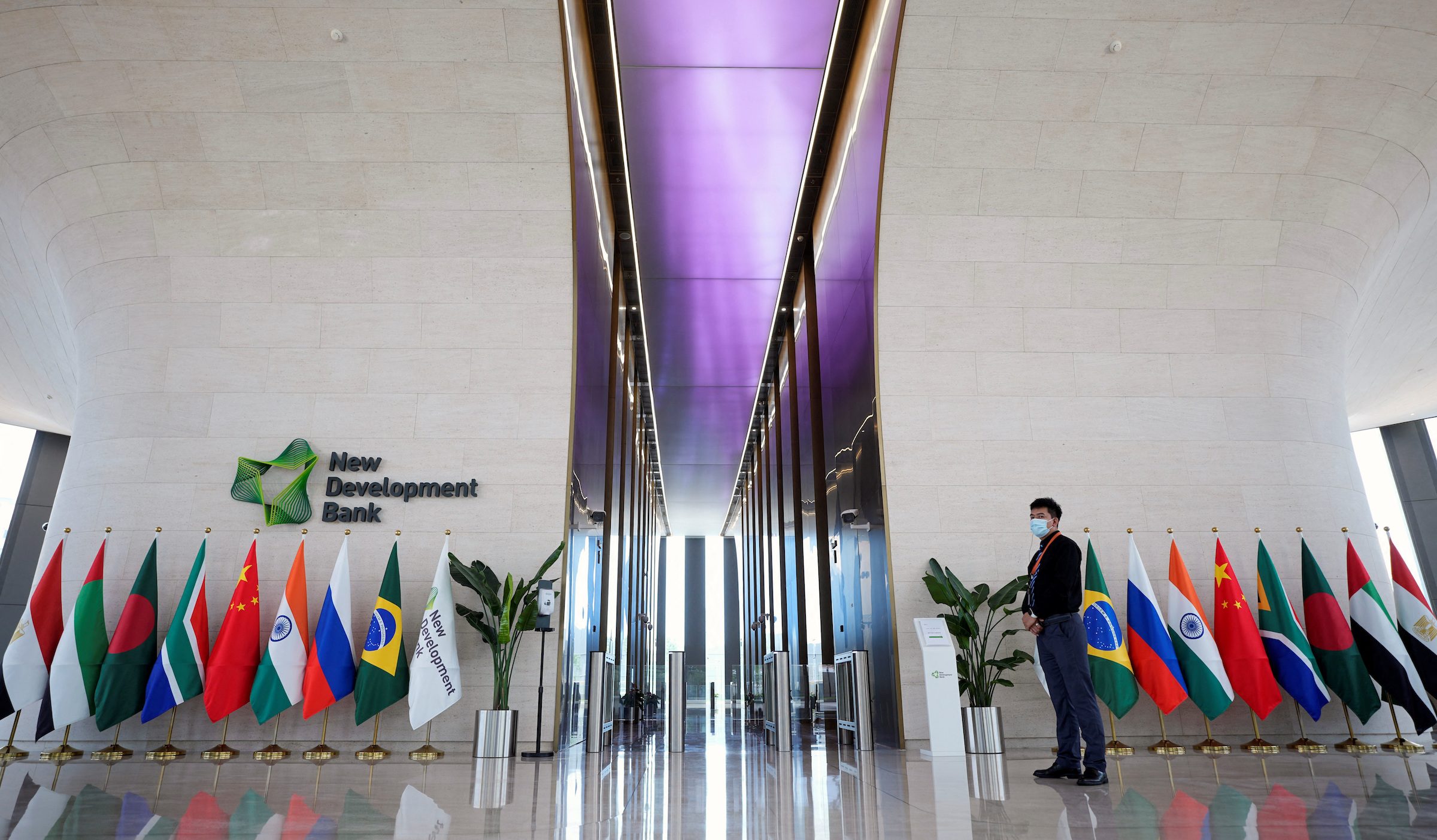 The flags of New Development Bank members, including the UAE and Egypt, at its headquarters in Shanghai